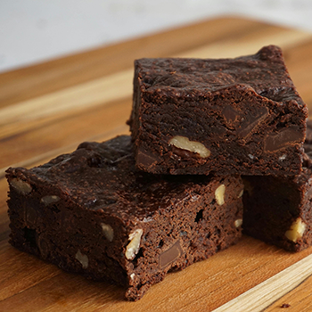 squares of brownies with nuts